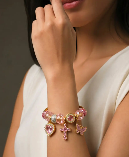 Sparkling Pink Charm Bangle - Heart, Cross & Butterfly Dangle Bracelet for Women | Trendy Gold-Tone Jewelry Gift