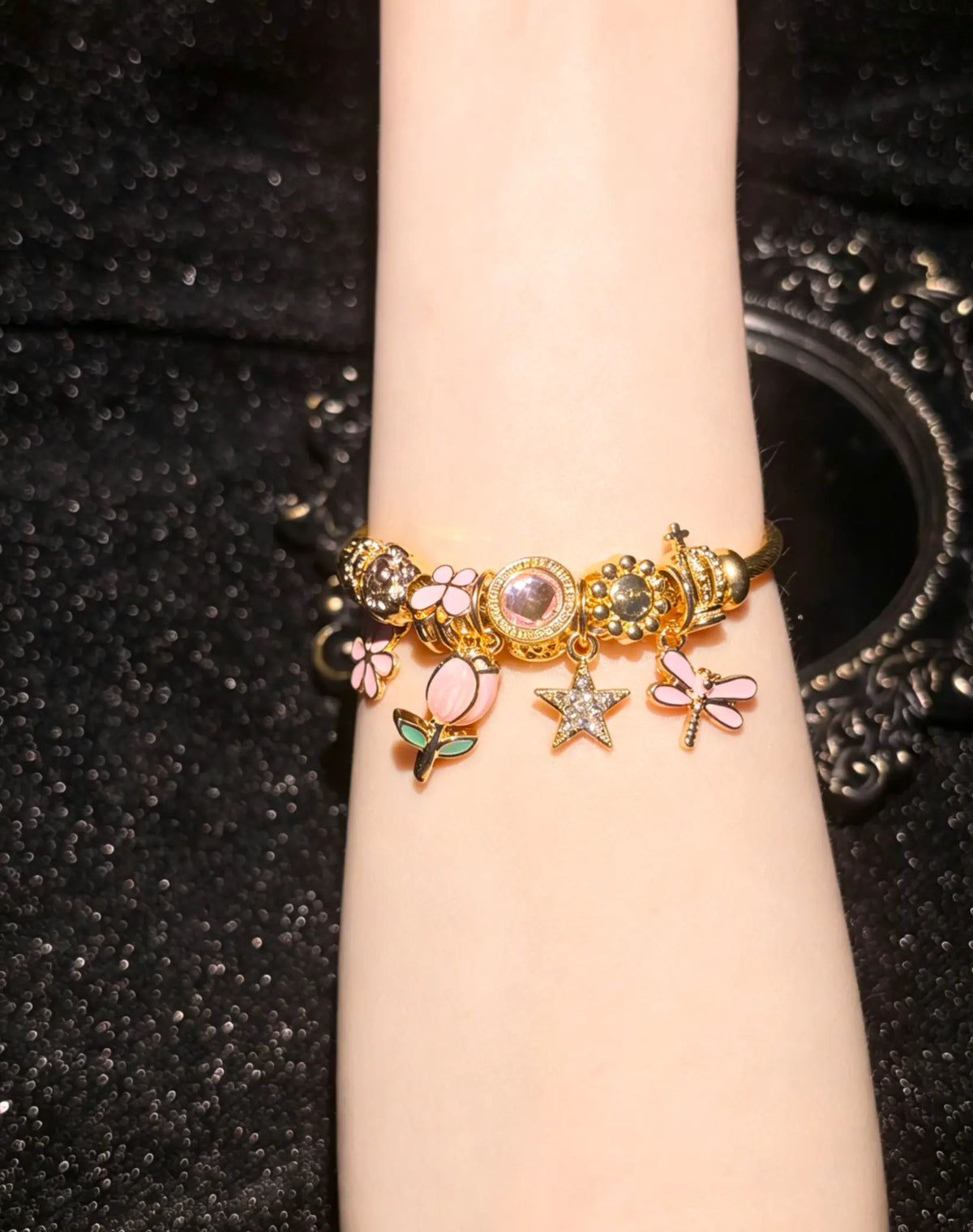 Women's Gold-Tone Open Bangle Bracelet with Pink Flower, Dragonfly, Star & Crown Charms, Stackable Costume Jewelry Gift
