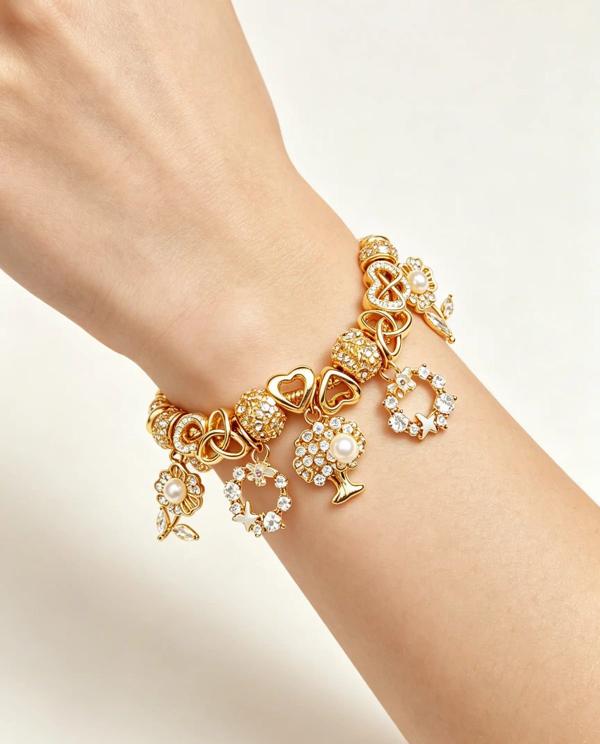 Gold-Tone Charm Bracelet for Women, Exquisitely Crafted Snake Chain Bracelet with Tree of Life, Flower, Heart, Pearl & Cubic Zirconia Charms, Adjustable