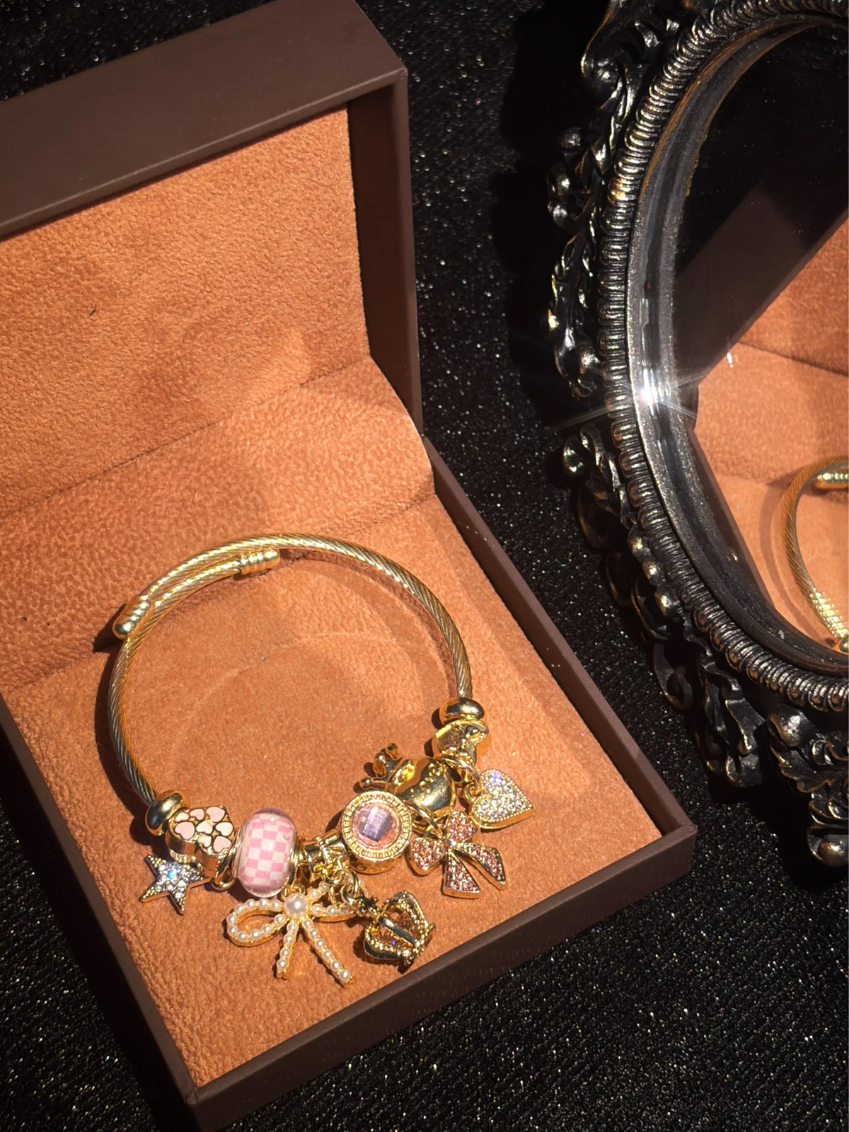 Women's Cute Princess-Style Gold-Tone Adjustable Cable Bangle with Pink Checkered Bead, Bow, Crown, and Heart Dangle Charms