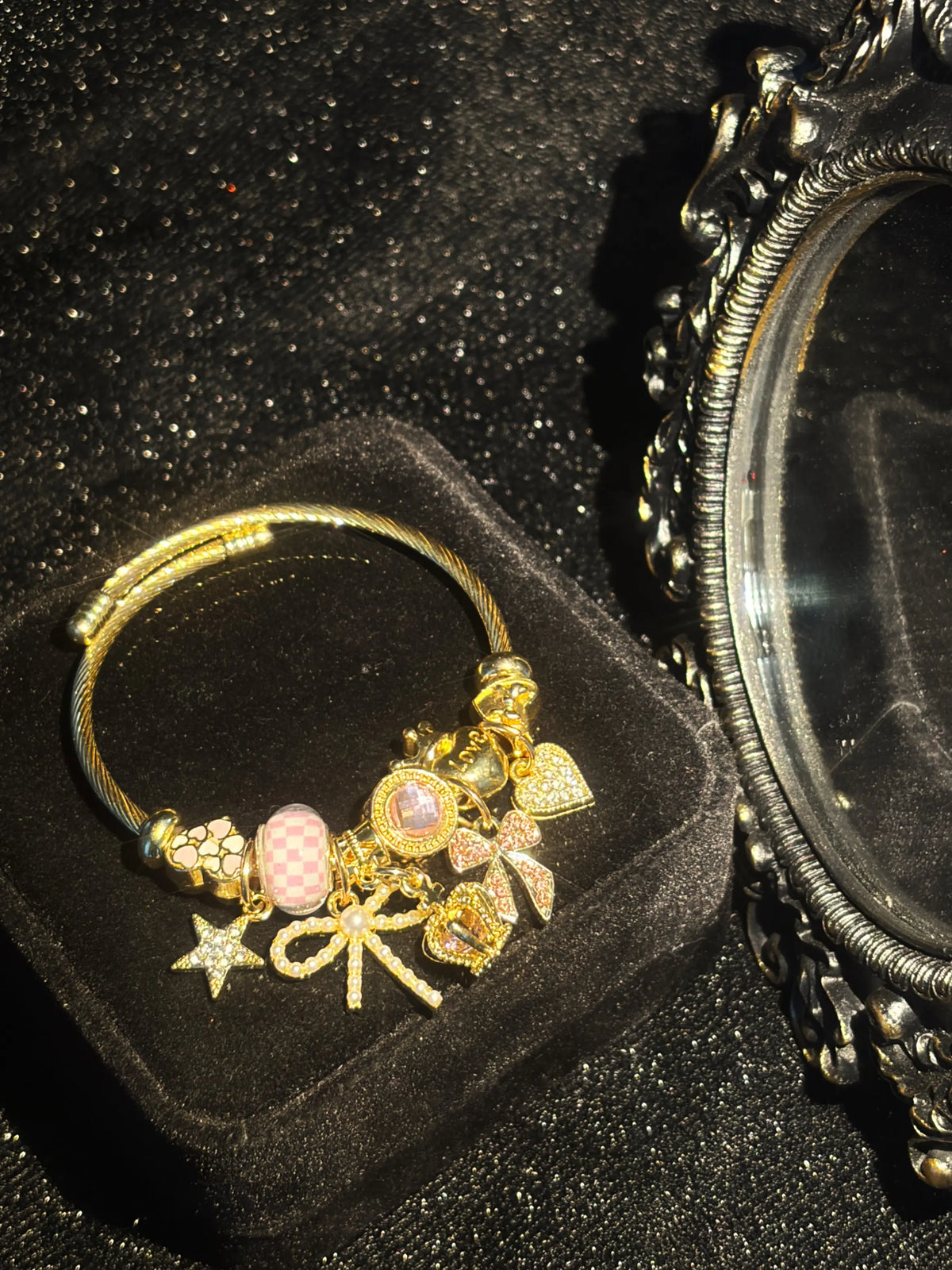 Women's Cute Princess-Style Gold-Tone Adjustable Cable Bangle with Pink Checkered Bead, Bow, Crown, and Heart Dangle Charms