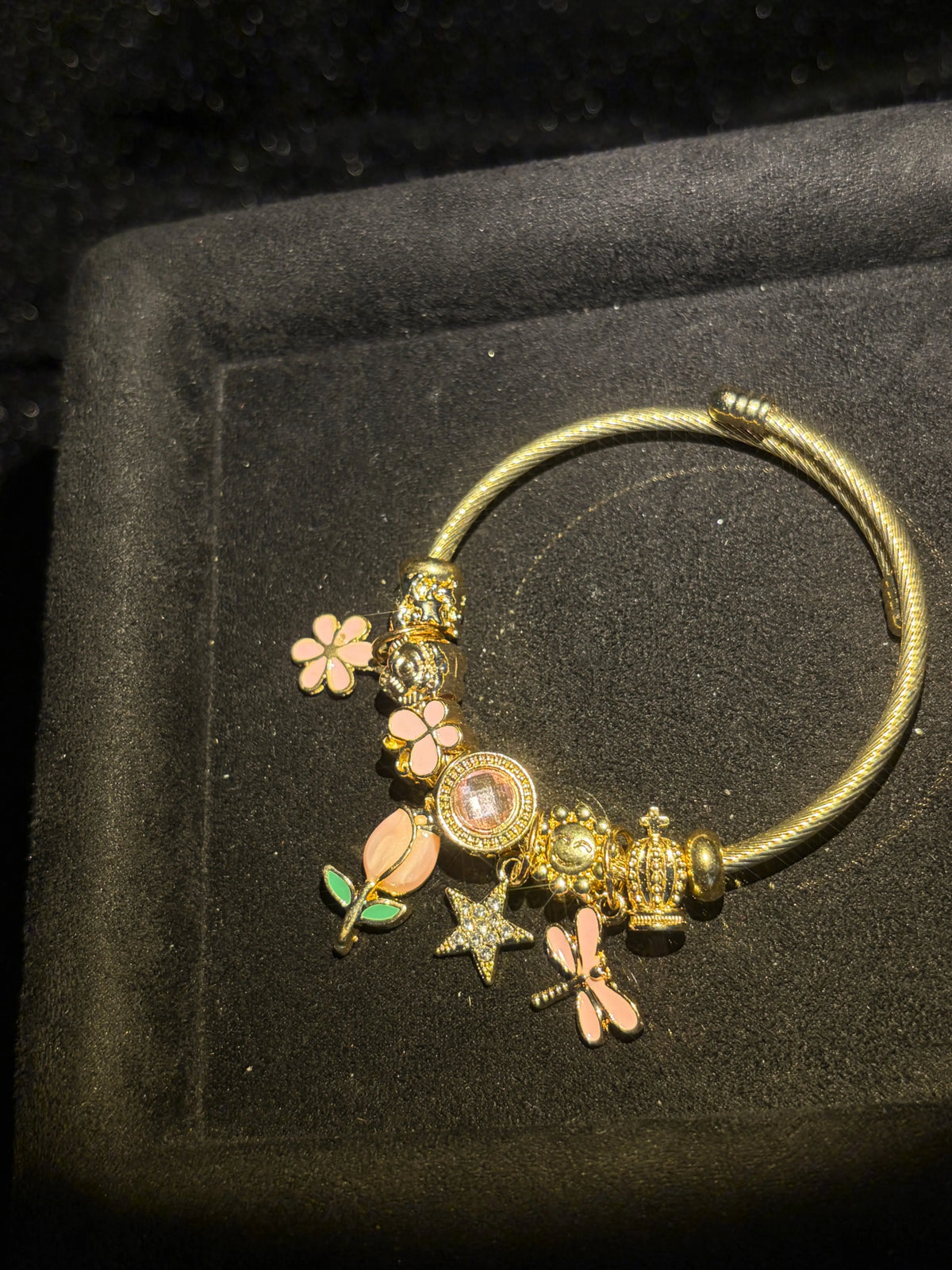 Women's Gold-Tone Open Bangle Bracelet with Pink Flower, Dragonfly, Star & Crown Charms, Stackable Costume Jewelry Gift